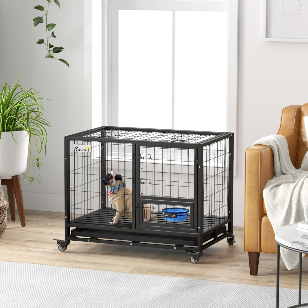 Cage noire sur roulettes pour grand chien