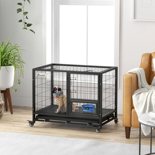 Cage noire sur roulettes pour grand chien